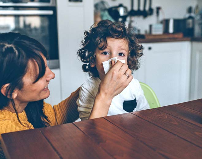 child sneezing